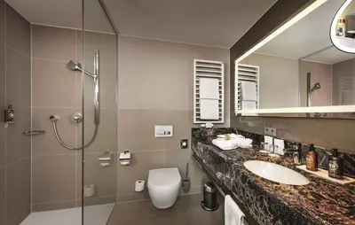 Ein Badezimmer in der Unterkunft Hotel Maximilian’s