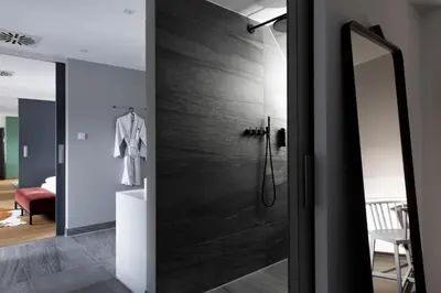 Ein Bett oder Betten in einem Zimmer der Unterkunft Hotel Maximilian’s