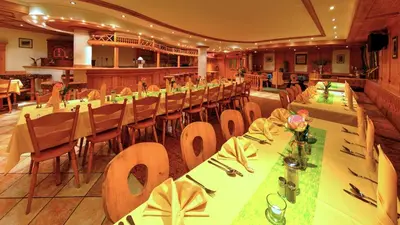 Ein Restaurant oder anderes Speiselokal in der Unterkunft Gasthof zur Post