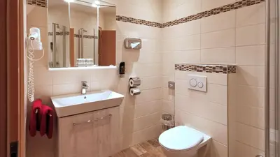 Ein Badezimmer in der Unterkunft Gasthof zur Post