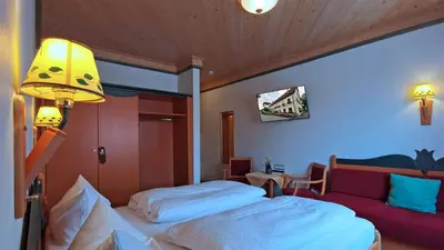 Ein Bett oder Betten in einem Zimmer der Unterkunft Gasthof zur Post