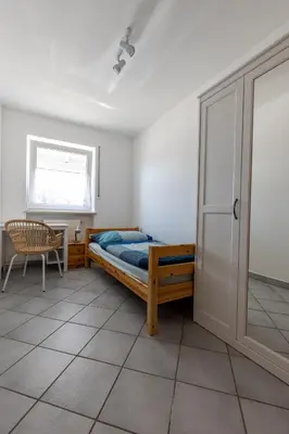 Ein Bett oder Betten in einem Zimmer der Unterkunft Ferienwohnung Garten mit Terrasse