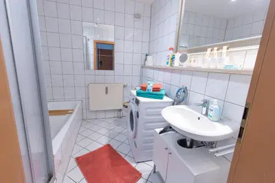 Ein Badezimmer in der Unterkunft Ferienwohnung Garten mit Terrasse