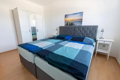 Ein Bett oder Betten in einem Zimmer der Unterkunft Ferienwohnung Garten mit Terrasse