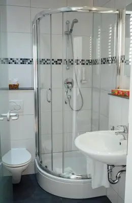 Ein Badezimmer in der Unterkunft Hotel Garni Ammergauer Hof