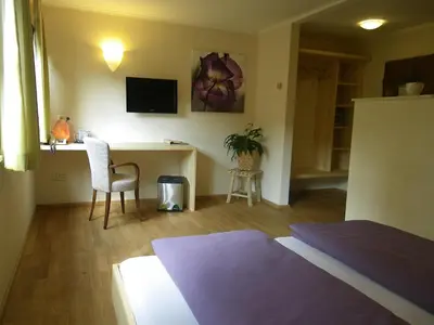 Ein Bett oder Betten in einem Zimmer der Unterkunft BIO Hotel Bayerischer Wirt Augsburg