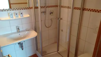 Ein Badezimmer in der Unterkunft Hotel Unterwirt