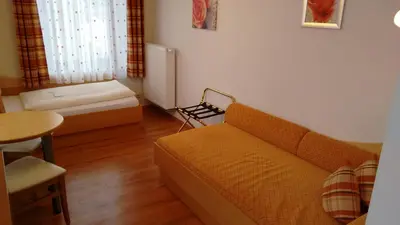 Ein Bett oder Betten in einem Zimmer der Unterkunft Hotel Unterwirt