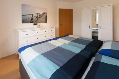Ein Bett oder Betten in einem Zimmer der Unterkunft Ferienwohnung Chiemsee