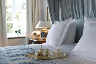 Ein Bett oder Betten in einem Zimmer der Unterkunft Brauereigasthof-Hotel Aying