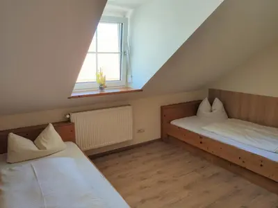 Ein Bett oder Betten in einem Zimmer der Unterkunft Landgasthof Braun