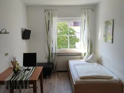 Ein Bett oder Betten in einem Zimmer der Unterkunft Landgasthof Braun