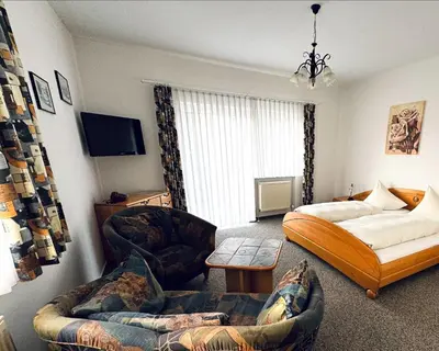 Ein Bett oder Betten in einem Zimmer der Unterkunft Pension Marcus