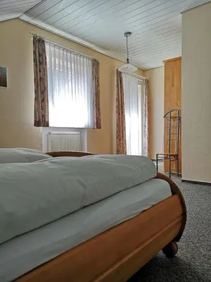 Ein Bett oder Betten in einem Zimmer der Unterkunft Pension Marcus