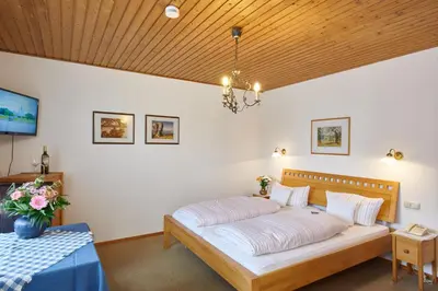 Ein Bett oder Betten in einem Zimmer der Unterkunft Alter Ziehbrunnen