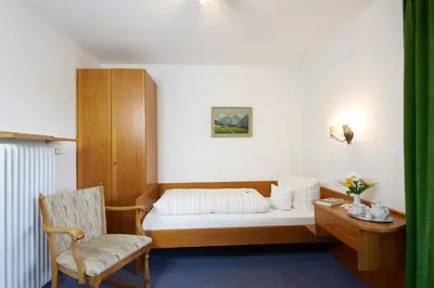 Ein Bett oder Betten in einem Zimmer der Unterkunft Alter Ziehbrunnen