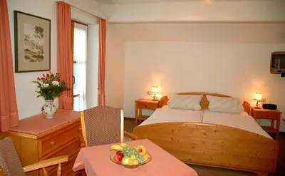 Ein Bett oder Betten in einem Zimmer der Unterkunft Alter Ziehbrunnen
