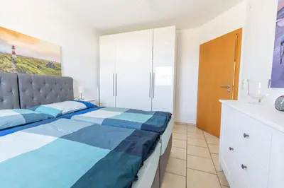 Ein Bett oder Betten in einem Zimmer der Unterkunft Ferienwohnung Salzburg