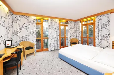 Ein Bett oder Betten in einem Zimmer der Unterkunft Villa Waldperlach by Blattl