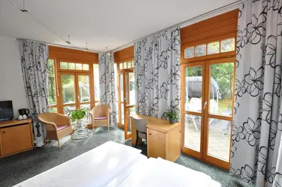 Ein Bett oder Betten in einem Zimmer der Unterkunft Villa Waldperlach by Blattl