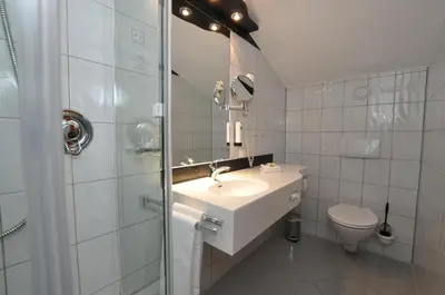 Ein Badezimmer in der Unterkunft Villa Waldperlach by Blattl