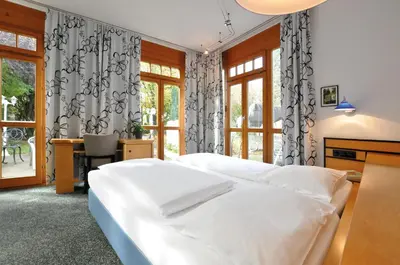 Ein Bett oder Betten in einem Zimmer der Unterkunft Villa Waldperlach by Blattl