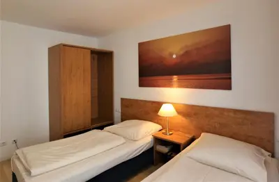 Ein Bett oder Betten in einem Zimmer der Unterkunft Hotel Christl München Innenstadt