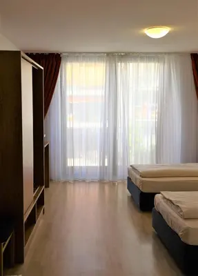 Ein Bett oder Betten in einem Zimmer der Unterkunft Hotel Christl München Innenstadt