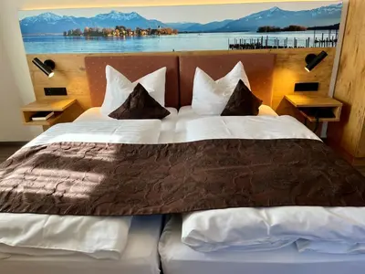 Ein Bett oder Betten in einem Zimmer der Unterkunft Hotel Oberwirt