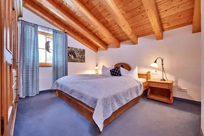 Ein Bett oder Betten in einem Zimmer der Unterkunft Hotel Föhrenhof