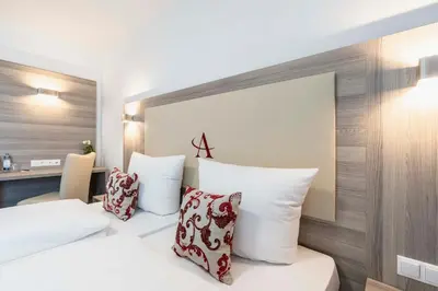 Ein Bett oder Betten in einem Zimmer der Unterkunft Abasto Hotel München Feldmoching