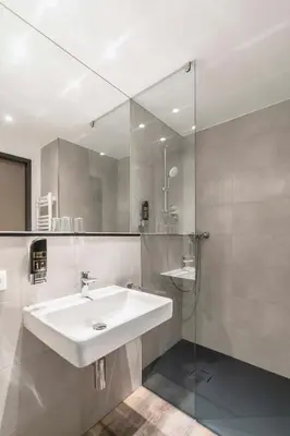 Ein Badezimmer in der Unterkunft Abasto Hotel München Feldmoching