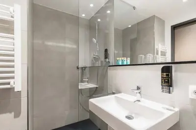 Ein Badezimmer in der Unterkunft Abasto Hotel München Feldmoching