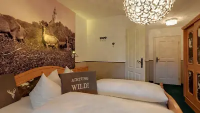 Ein Bett oder Betten in einem Zimmer der Unterkunft Boutique Hotel POST ANDECHS