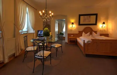 Ein Bett oder Betten in einem Zimmer der Unterkunft Boutique Hotel POST ANDECHS