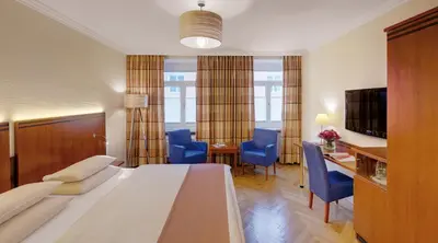 TV/Unterhaltungsangebot in der Unterkunft Alpen Hotel München
