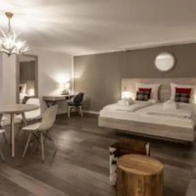 Ein Bett oder Betten in einem Zimmer der Unterkunft Karma Bavaria