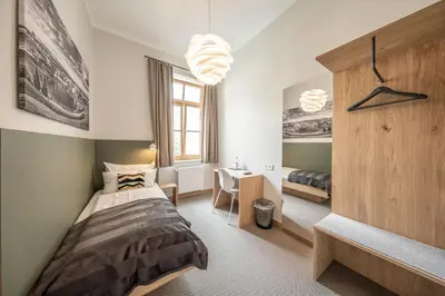 Ein Bett oder Betten in einem Zimmer der Unterkunft Hotel Am Markt