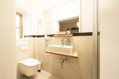 Ein Badezimmer in der Unterkunft Hotel Am Markt
