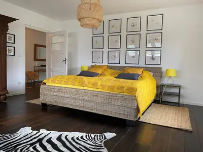 Ein Bett oder Betten in einem Zimmer der Unterkunft Ferienwohnung mit Alpenblick