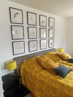 Ein Bett oder Betten in einem Zimmer der Unterkunft Ferienwohnung mit Alpenblick
