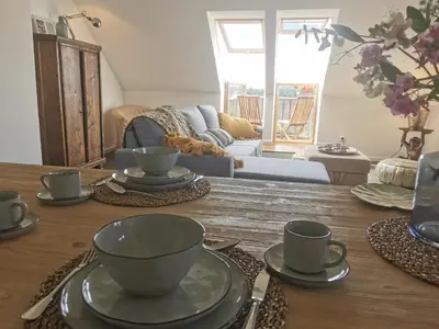 Ein Sitzbereich in der Unterkunft Ferienwohnung mit Alpenblick