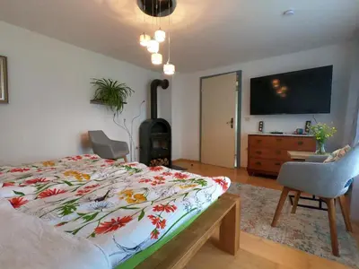 Ein Bett oder Betten in einem Zimmer der Unterkunft Ferienwohnung Vroni