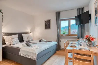 Ein Bett oder Betten in einem Zimmer der Unterkunft Ferienwohnung Wendelstein