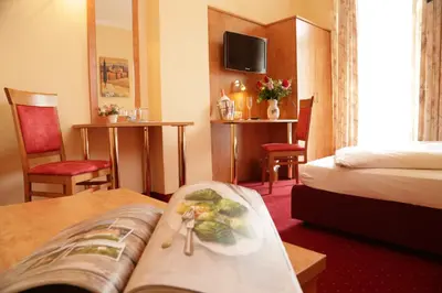 Ein Bett oder Betten in einem Zimmer der Unterkunft Gasthof Prinzregent Superior