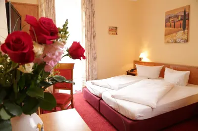 Ein Bett oder Betten in einem Zimmer der Unterkunft Gasthof Prinzregent Superior