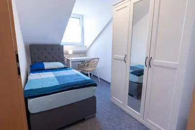 Ein Bett oder Betten in einem Zimmer der Unterkunft Ferienwohnung Burghausen