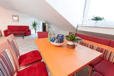 Ein Sitzbereich in der Unterkunft Ferienwohnung Burghausen