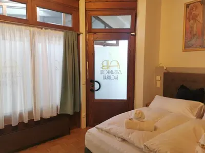 Ein Bett oder Betten in einem Zimmer der Unterkunft Altstadthotel Bachbräu