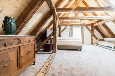 Ein Bett oder Betten in einem Zimmer der Unterkunft Altstadthotel Bachbräu